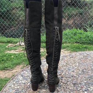 Knee high short heeled boots